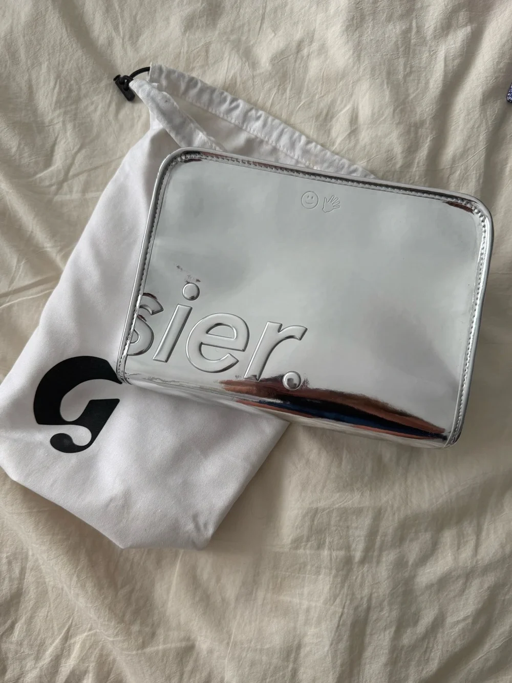 Limited Glossier Chrome make-up bag
